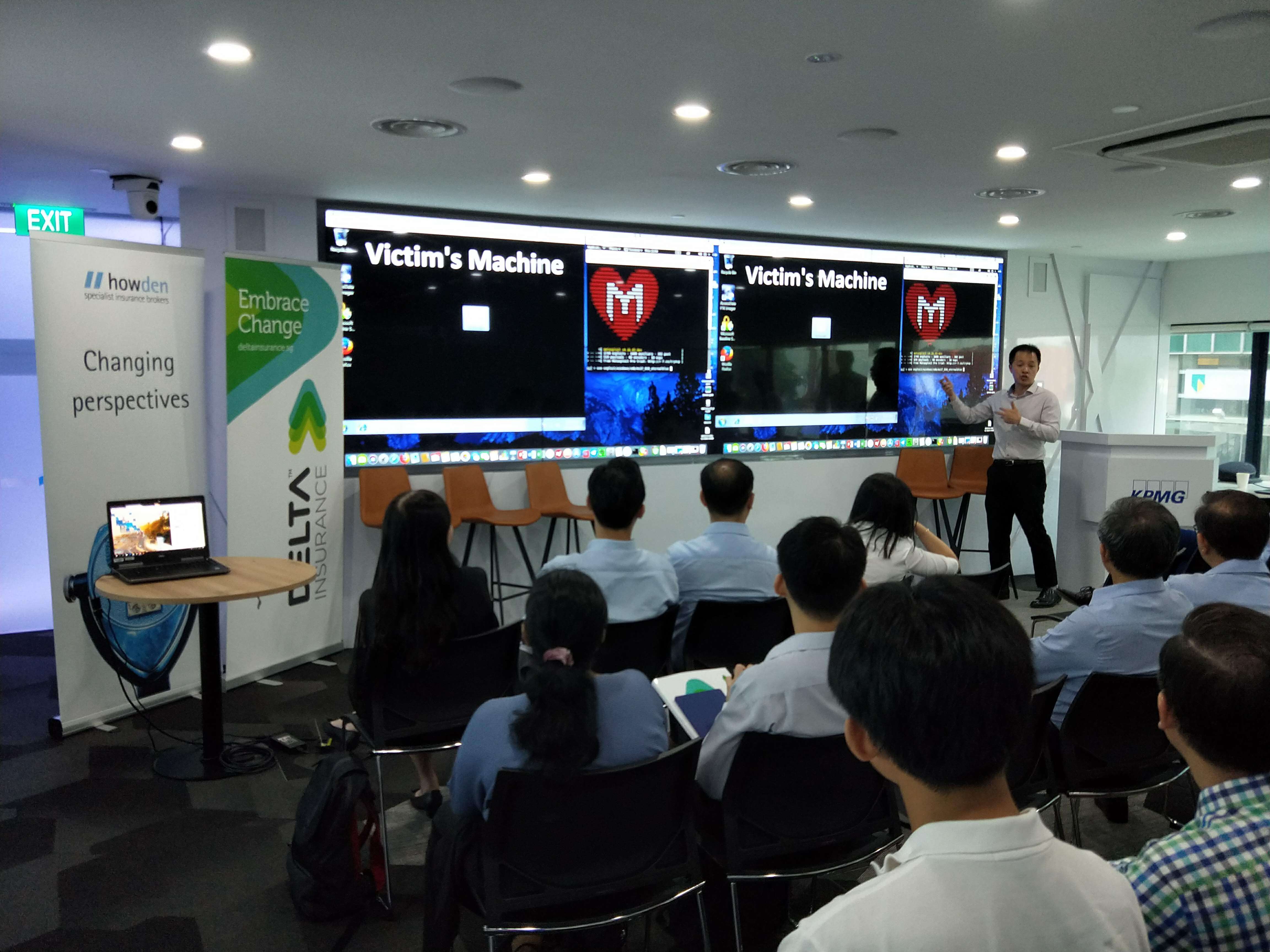 A cyber attack behind show on a screen in a seminar