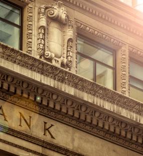 The ornate stone facade of a bank