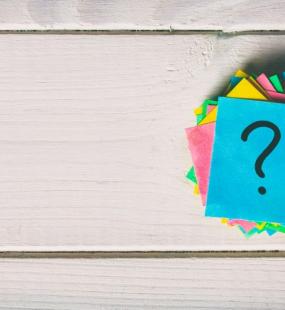 post-it notes on wood background