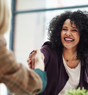Two women chatting - Supporting your employees in the current unprecedented times