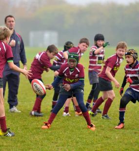 Children playing rugby