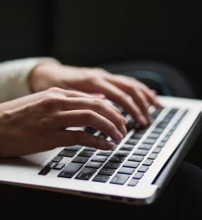 Employee typing on keyboard 