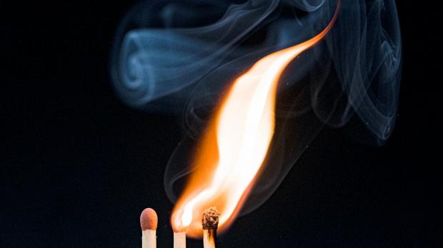 Three matches, with two alight and one unlit