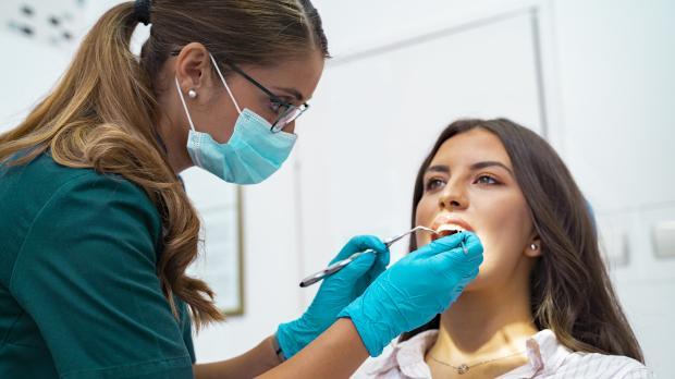 Dentist woman in chair