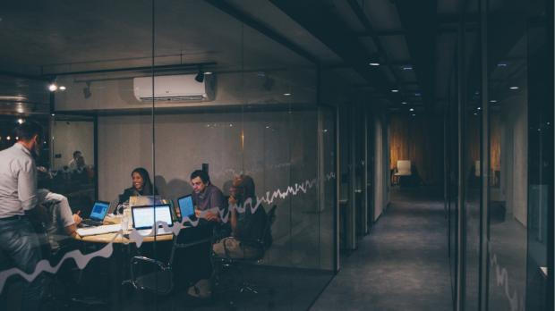 group of business people working in office setting